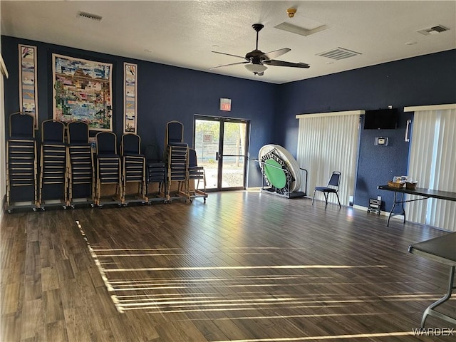 6246 S Vista Laguna Dr, Fort Mohave, AZ 86426 - miscellaneous room with wood finished floors, visible vents, and ceiling fan