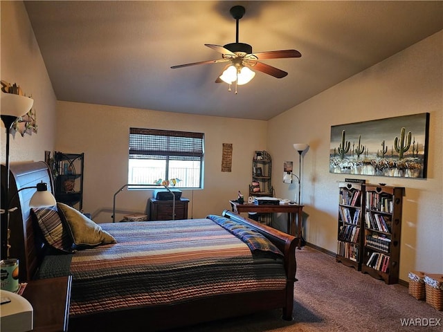 6246 S Vista Laguna Dr, Fort Mohave, AZ 86426 - carpeted bedroom with vaulted ceiling, baseboards, and a ceiling fan
