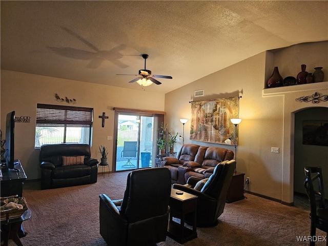 6246 S Vista Laguna Dr, Fort Mohave, AZ 86426 - living room featuring lofted ceiling, a ceiling fan, carpet flooring, and visible vents
