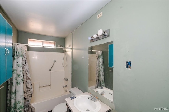 bathroom with vanity, toilet, and shower / tub combo with curtain