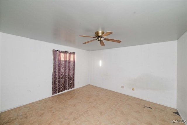 empty room featuring a ceiling fan