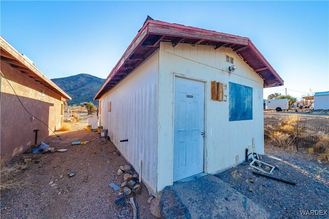 view of outdoor structure with a mountain view