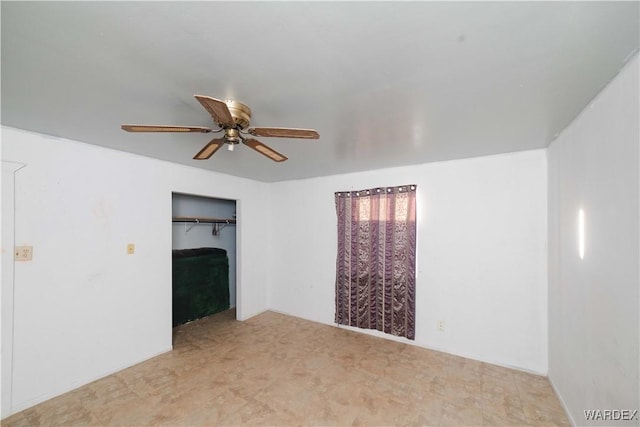 spare room featuring ceiling fan