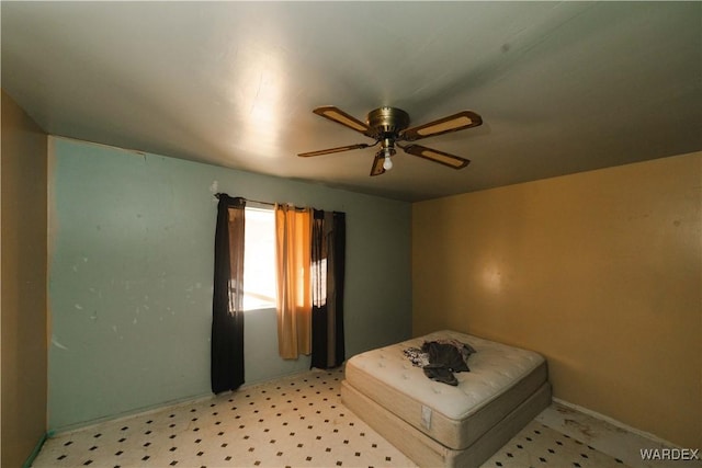 bedroom with ceiling fan and light floors