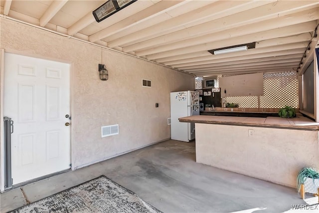 view of patio / terrace with visible vents