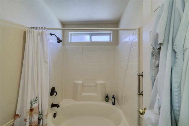 2041 E Sundance Dr, Fort Mohave, AZ 86426 - full bathroom featuring shower / bath combination with curtain and a textured ceiling