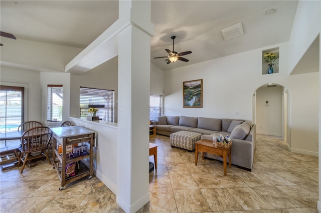 2041 E Sundance Dr, Fort Mohave, AZ 86426 - living area featuring ceiling fan, lofted ceiling, and arched walkways