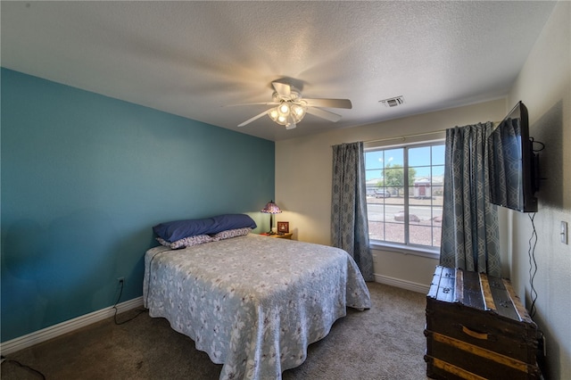 2041 E Sundance Dr, Fort Mohave, AZ 86426 - bedroom with carpet flooring, ceiling fan, and a textured ceiling