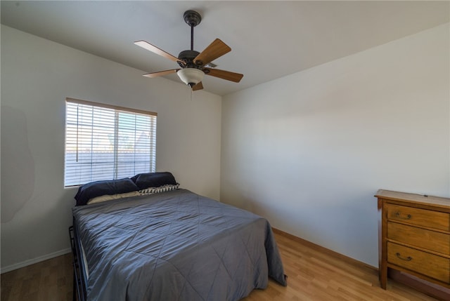 2041 E Sundance Dr, Fort Mohave, AZ 86426 - bedroom with light wood finished floors and ceiling fan