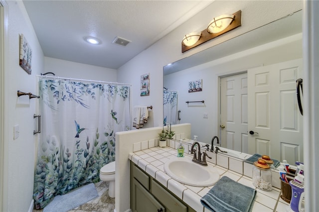 2041 E Sundance Dr, Fort Mohave, AZ 86426 - bathroom with vanity, curtained shower, recessed lighting, and tile patterned flooring