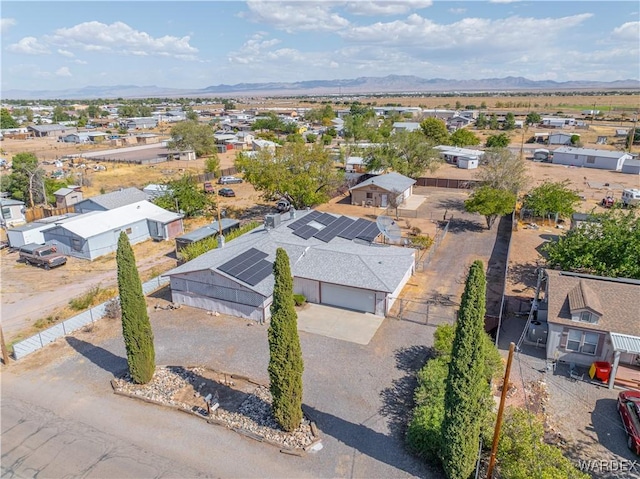 bird's eye view featuring a residential view and a mountain view