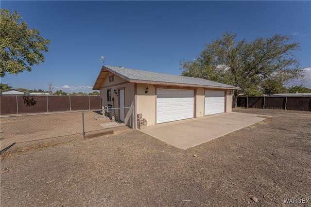 detached garage with fence