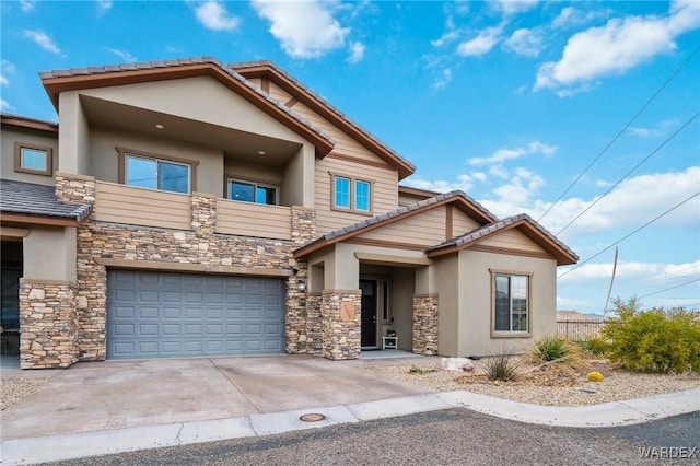 craftsman house featuring an attached garage, a tile roof, concrete driveway, stone siding, and stucco siding