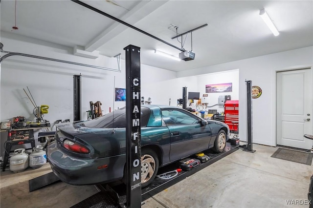 garage featuring a garage door opener