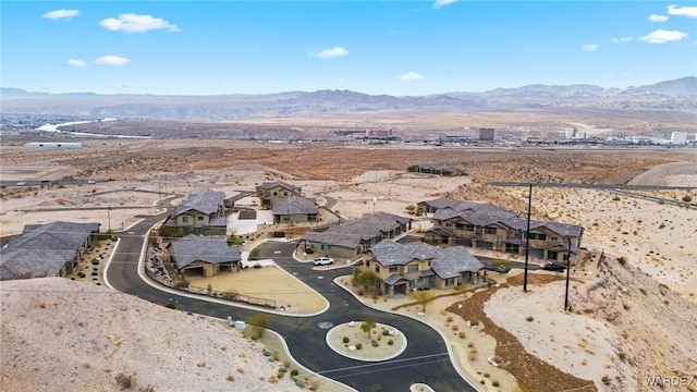 bird's eye view with a residential view and a mountain view