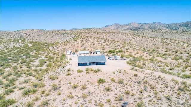 drone / aerial view featuring a mountain view