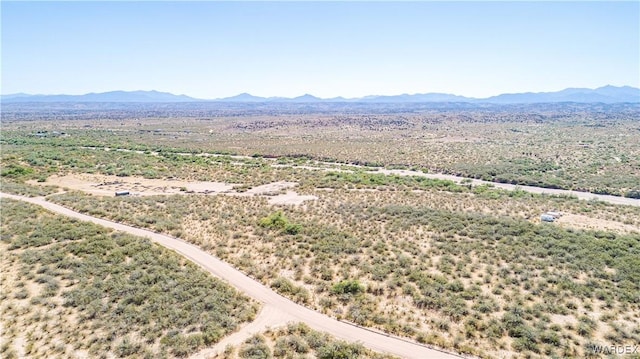 drone / aerial view featuring a mountain view