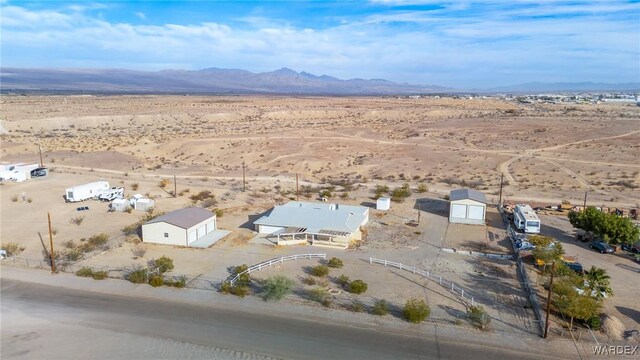 bird's eye view with a mountain view and view of desert