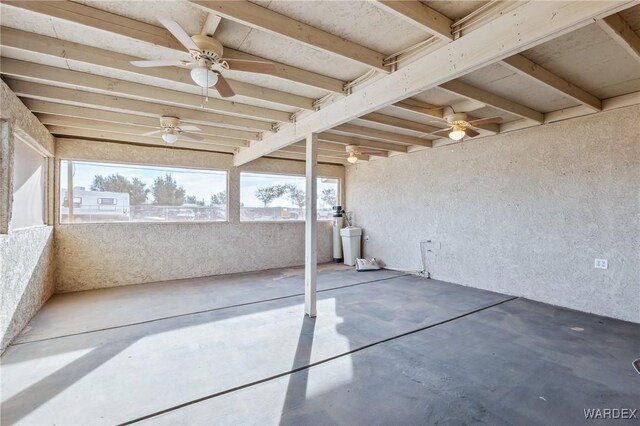 view of patio featuring ceiling fan