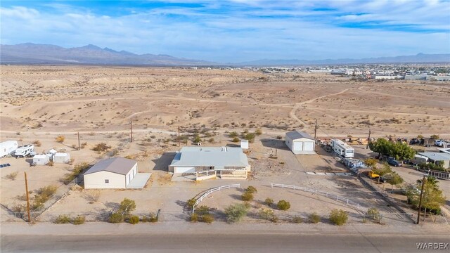 bird's eye view featuring a desert view and a mountain view