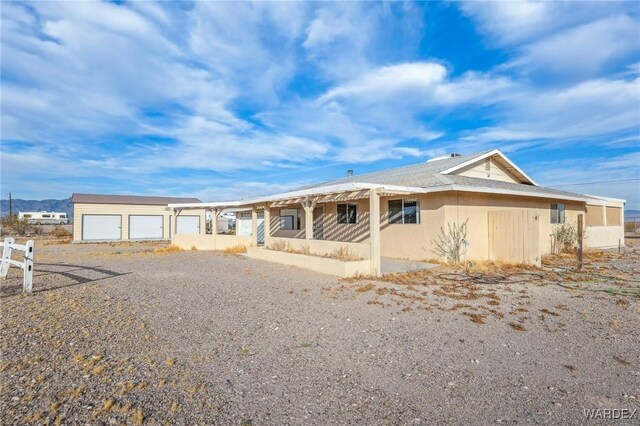 view of front of home with stucco siding