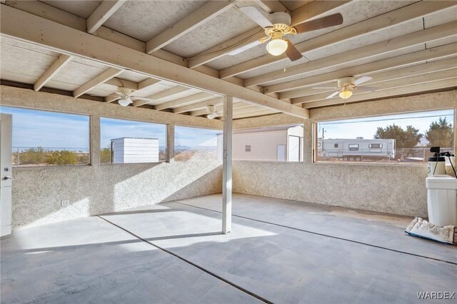 view of patio / terrace with a ceiling fan and fence private yard