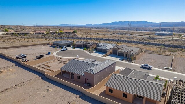 birds eye view of property featuring a residential view and a mountain view