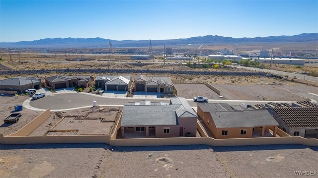 birds eye view of property with a residential view and a mountain view