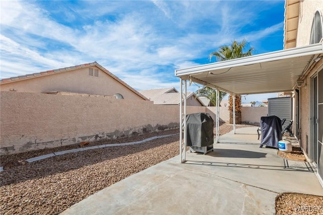 view of patio / terrace with a fenced backyard and grilling area