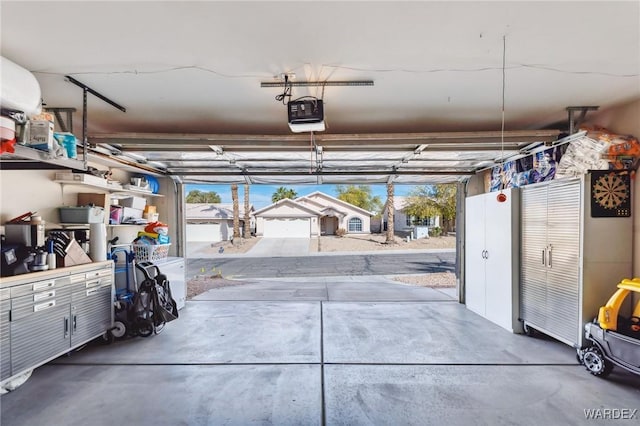 garage featuring a garage door opener