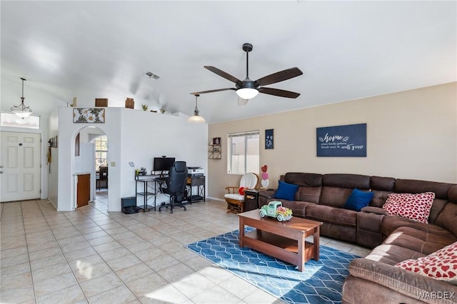 living area featuring light tile patterned floors, visible vents, arched walkways, a ceiling fan, and lofted ceiling