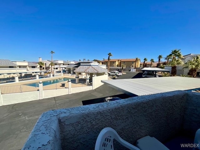 balcony featuring a residential view