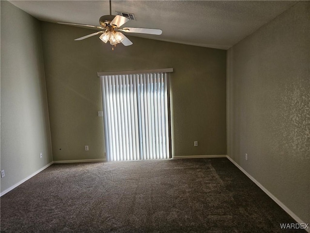 unfurnished room with ceiling fan, a textured ceiling, carpet floors, visible vents, and vaulted ceiling