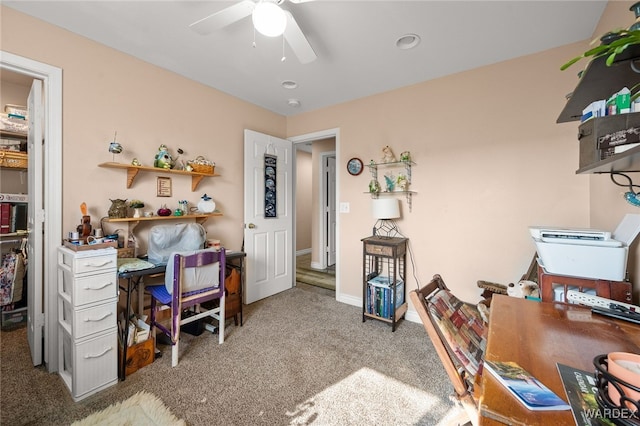 home office featuring ceiling fan, carpet flooring, and baseboards