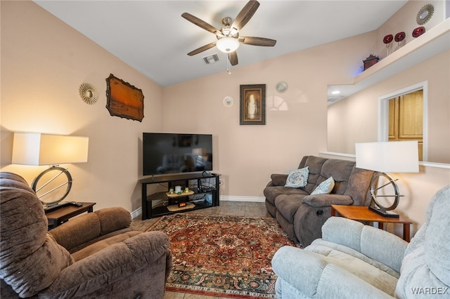 living room with visible vents, vaulted ceiling, baseboards, and ceiling fan