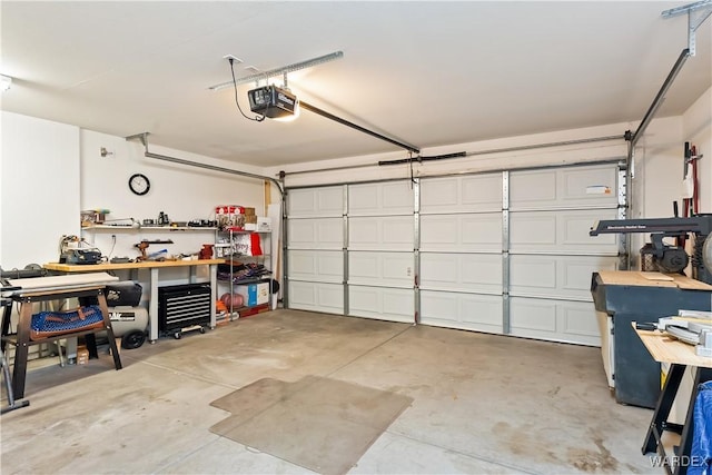 garage featuring a garage door opener