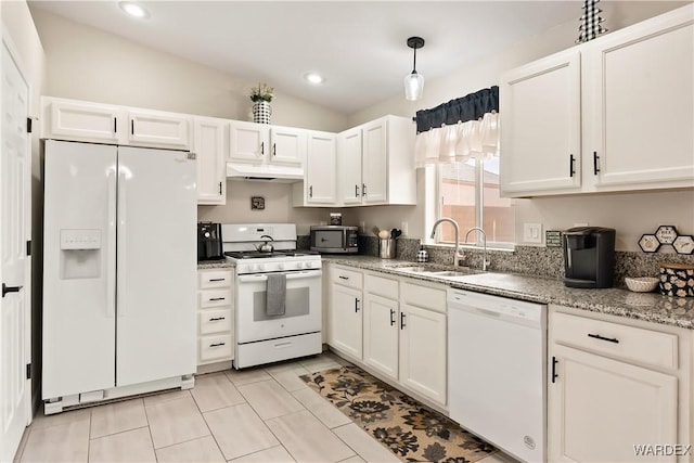 kitchen with under cabinet range hood, white appliances, a sink, and white cabinetry