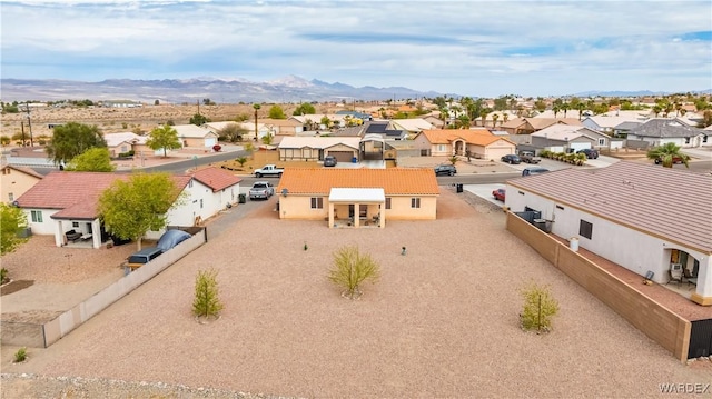 aerial view featuring a mountain view and a residential view