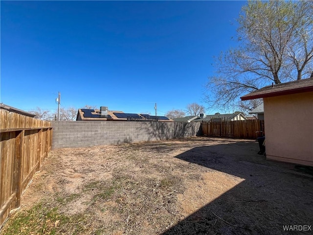 view of yard featuring a fenced backyard