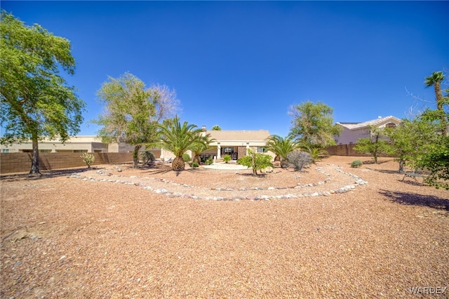exterior space featuring a fenced backyard