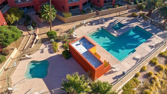 view of swimming pool with a patio area