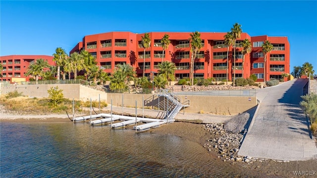 view of property with a water view