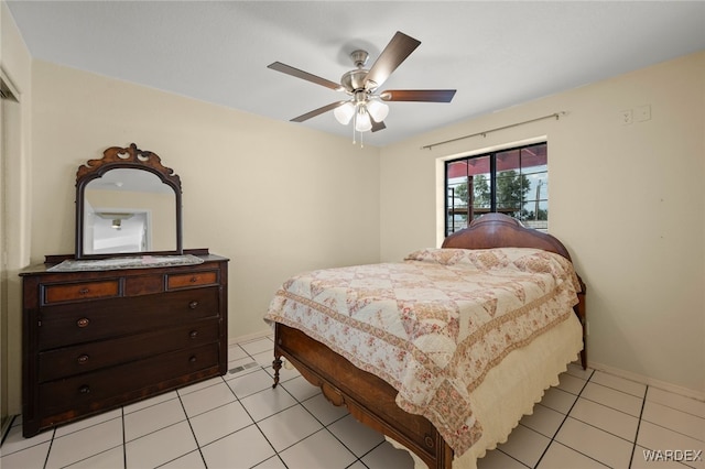 4393 S Colorado Rd, Fort Mohave, AZ 86426 - bedroom featuring light tile patterned floors, baseboards, and ceiling fan