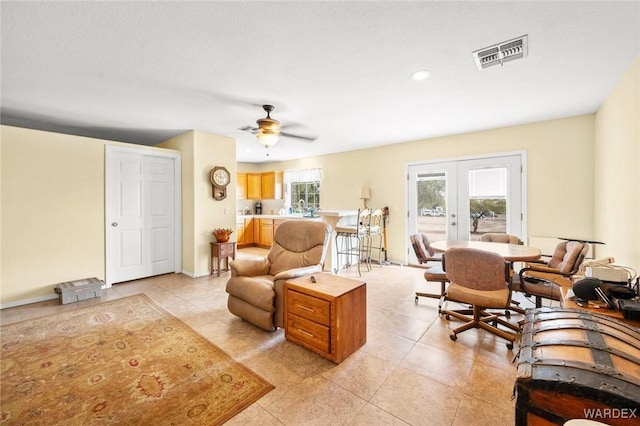 4393 S Colorado Rd, Fort Mohave, AZ 86426 - living area featuring a ceiling fan, visible vents, french doors, and light tile patterned floors