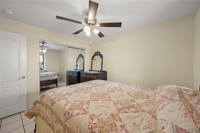 4393 S Colorado Rd, Fort Mohave, AZ 86426 - bedroom featuring ceiling fan, light tile patterned floors, and a closet