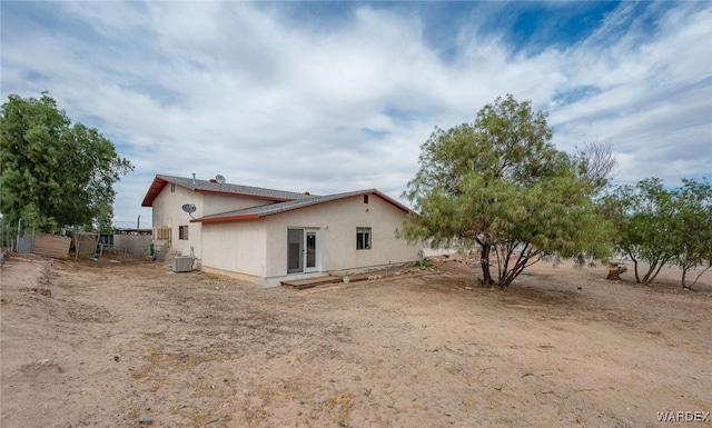 4393 S Colorado Rd, Fort Mohave, AZ 86426 - rear view of property with central air condition unit and stucco siding