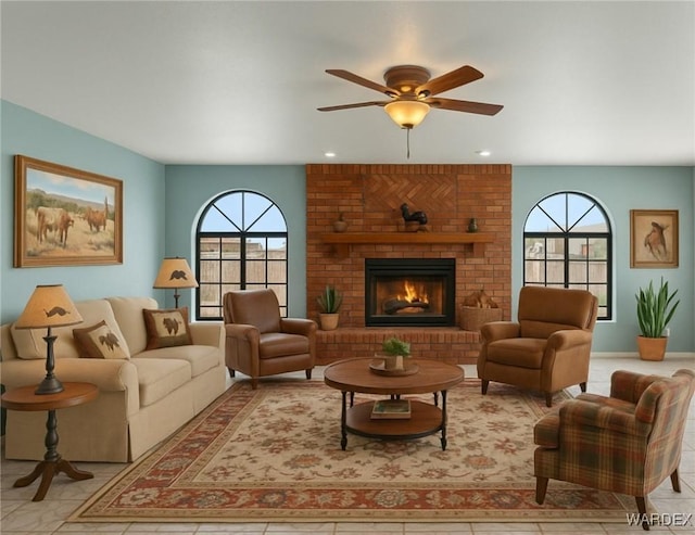 4393 S Colorado Rd, Fort Mohave, AZ 86426 - living room featuring a healthy amount of sunlight, ceiling fan, a brick fireplace, and recessed lighting
