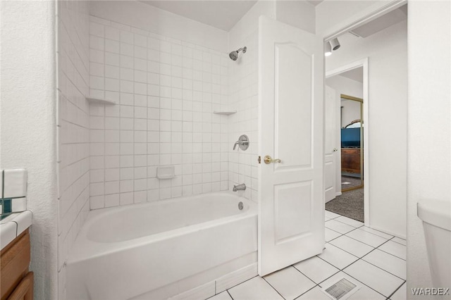4393 S Colorado Rd, Fort Mohave, AZ 86426 - full bath featuring vanity, tile patterned flooring, visible vents, and shower / washtub combination