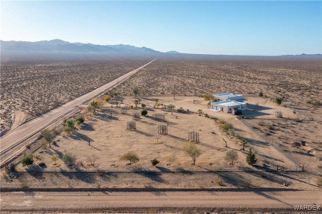 aerial view featuring view of desert, a rural view, and a mountain view