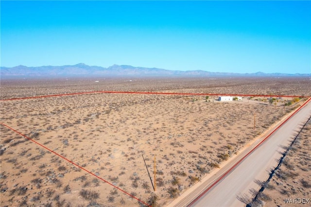 birds eye view of property featuring a mountain view